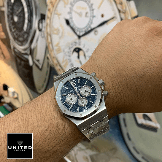 Audemars Piguet Stainless Steel Blue Dial Replica on the man wrist watch background