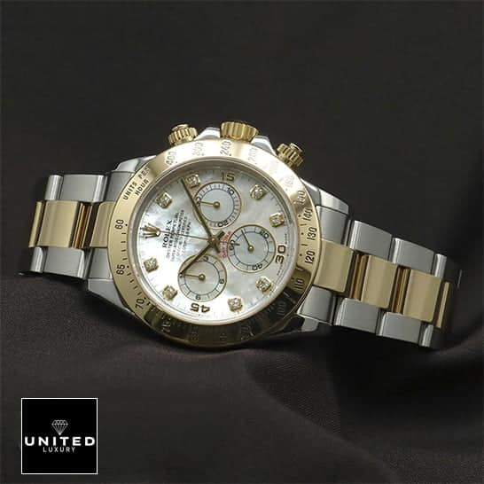 Rolex Daytona Two Tone White Dial 116523 Replica 1 Rolex Daytona Two Tone White Dial 116523 Replica on the black table